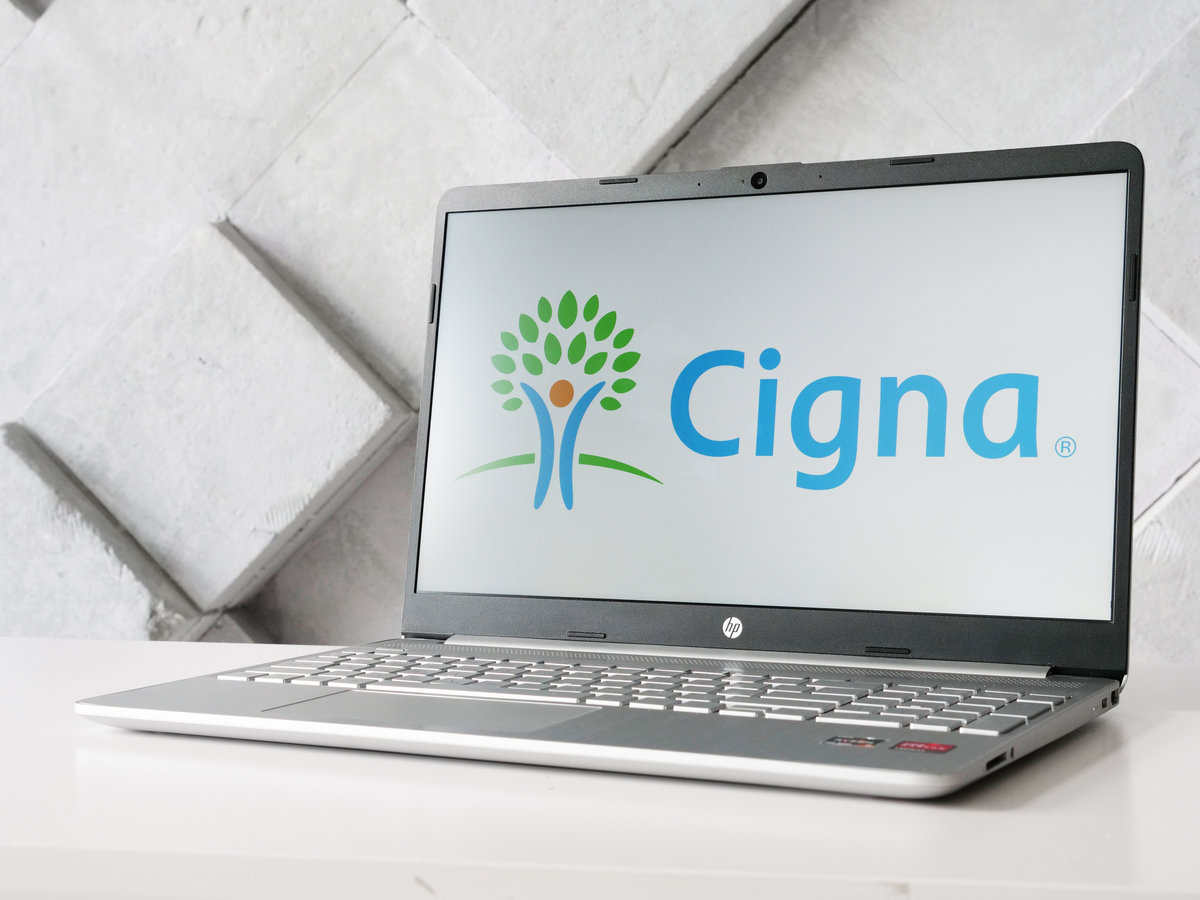 Kyiv, Ukraine - July 03, 2021. Cigna Corporation logo of American health insurance company on the screen in front of webpage